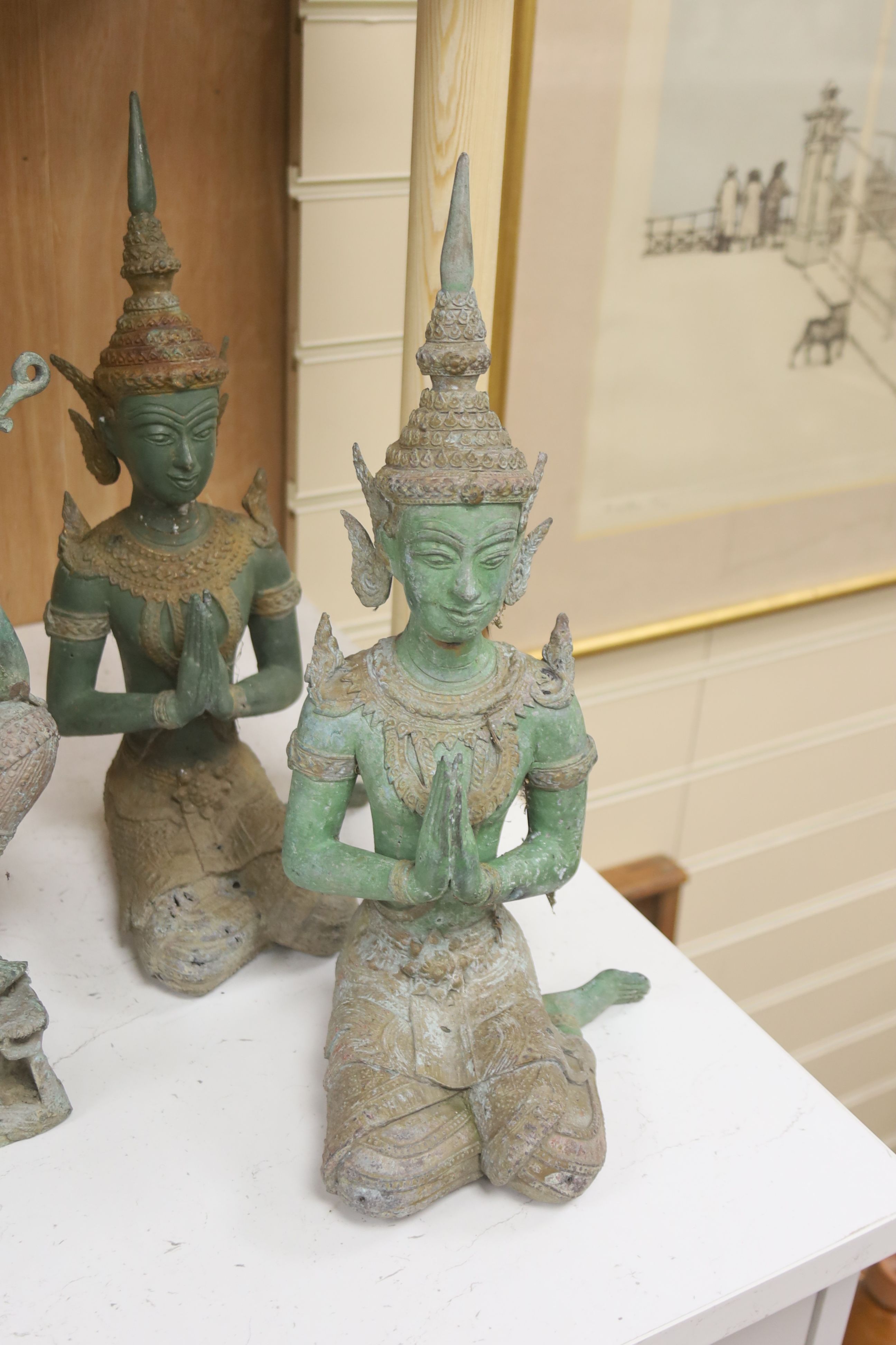 Four 20th century Thai bronze Buddhas, tallest 58cm